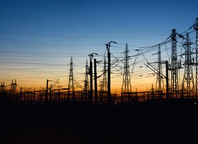 electricity-pylons-at-night